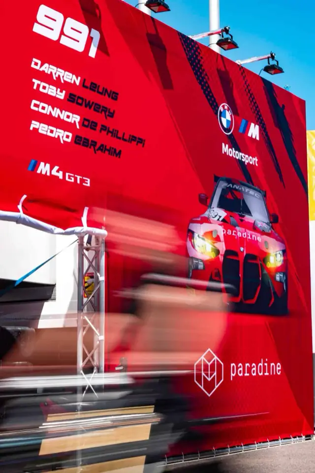 Paradine Competition #991 BMW M4 GT3 pit banner designed by Motorsport GFX